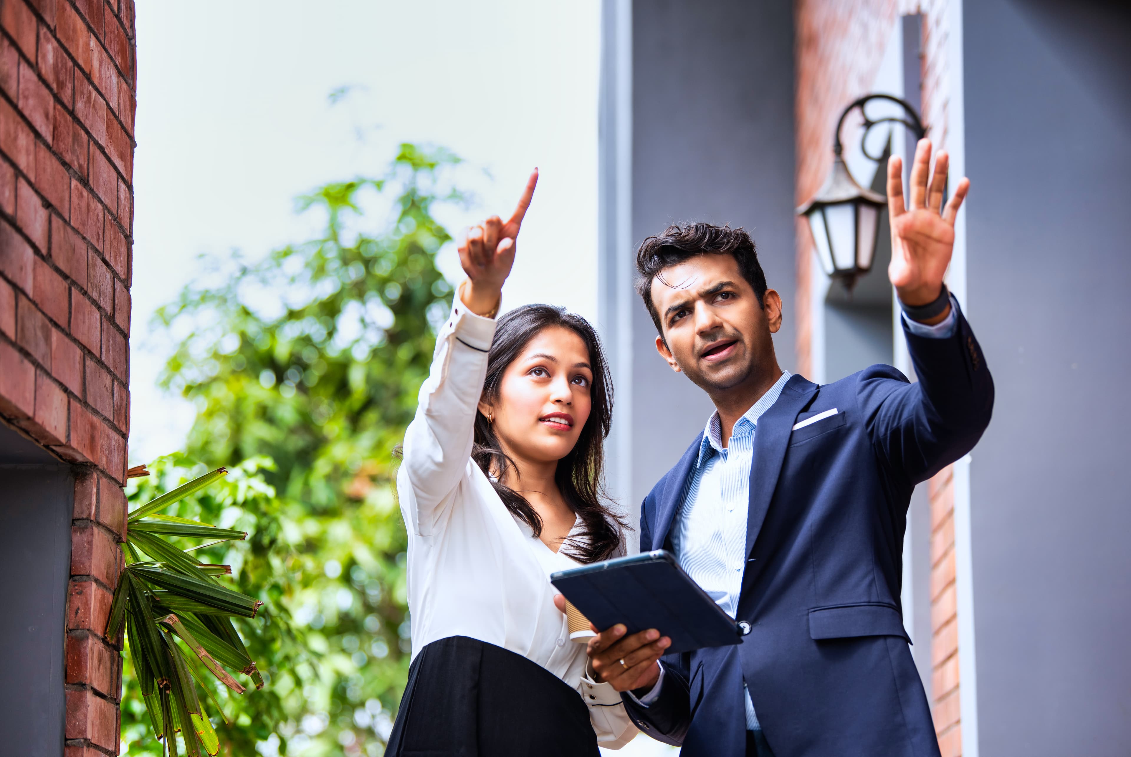 Business professionals consulting outdoors