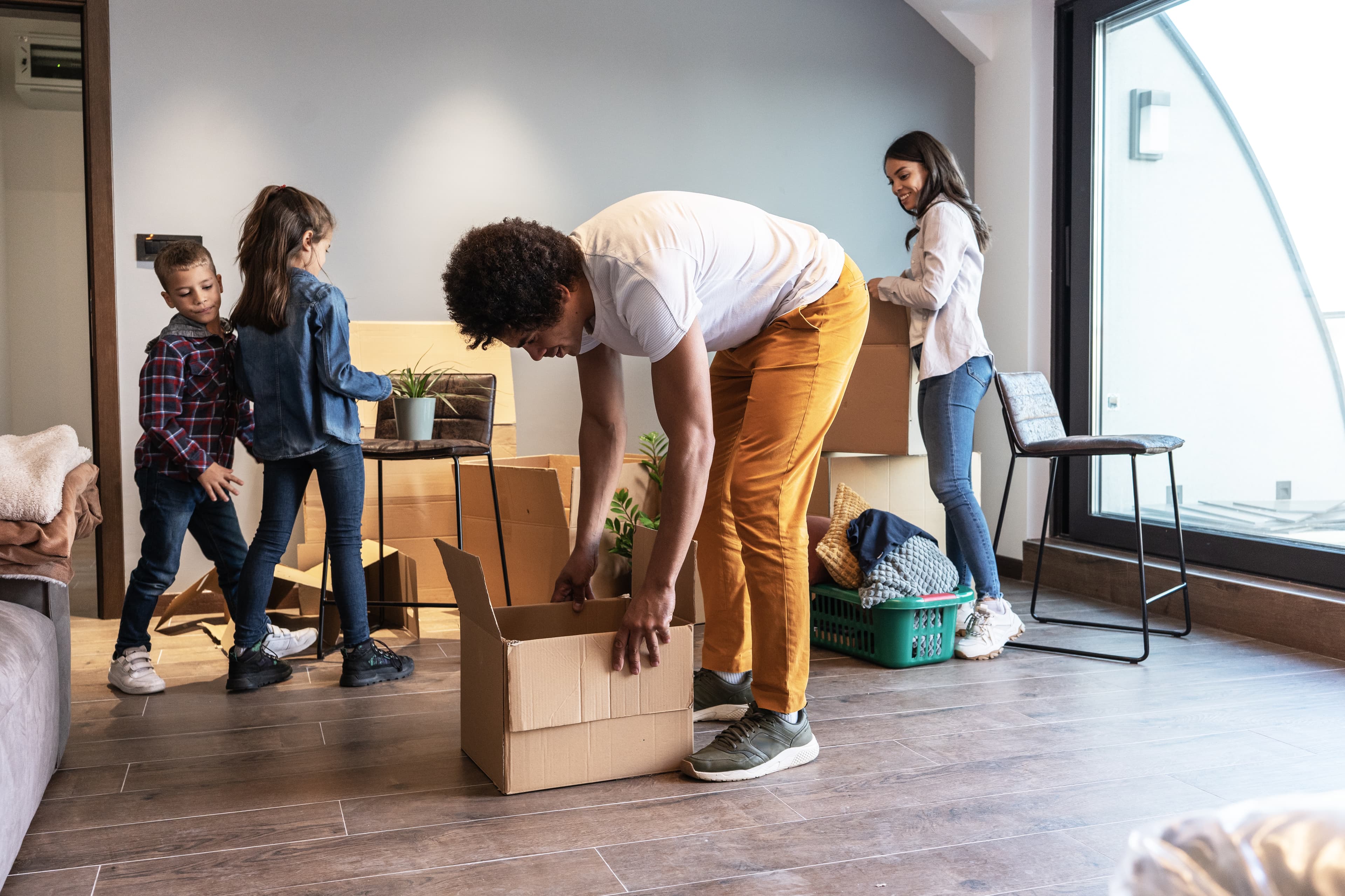 Family moving into their new home