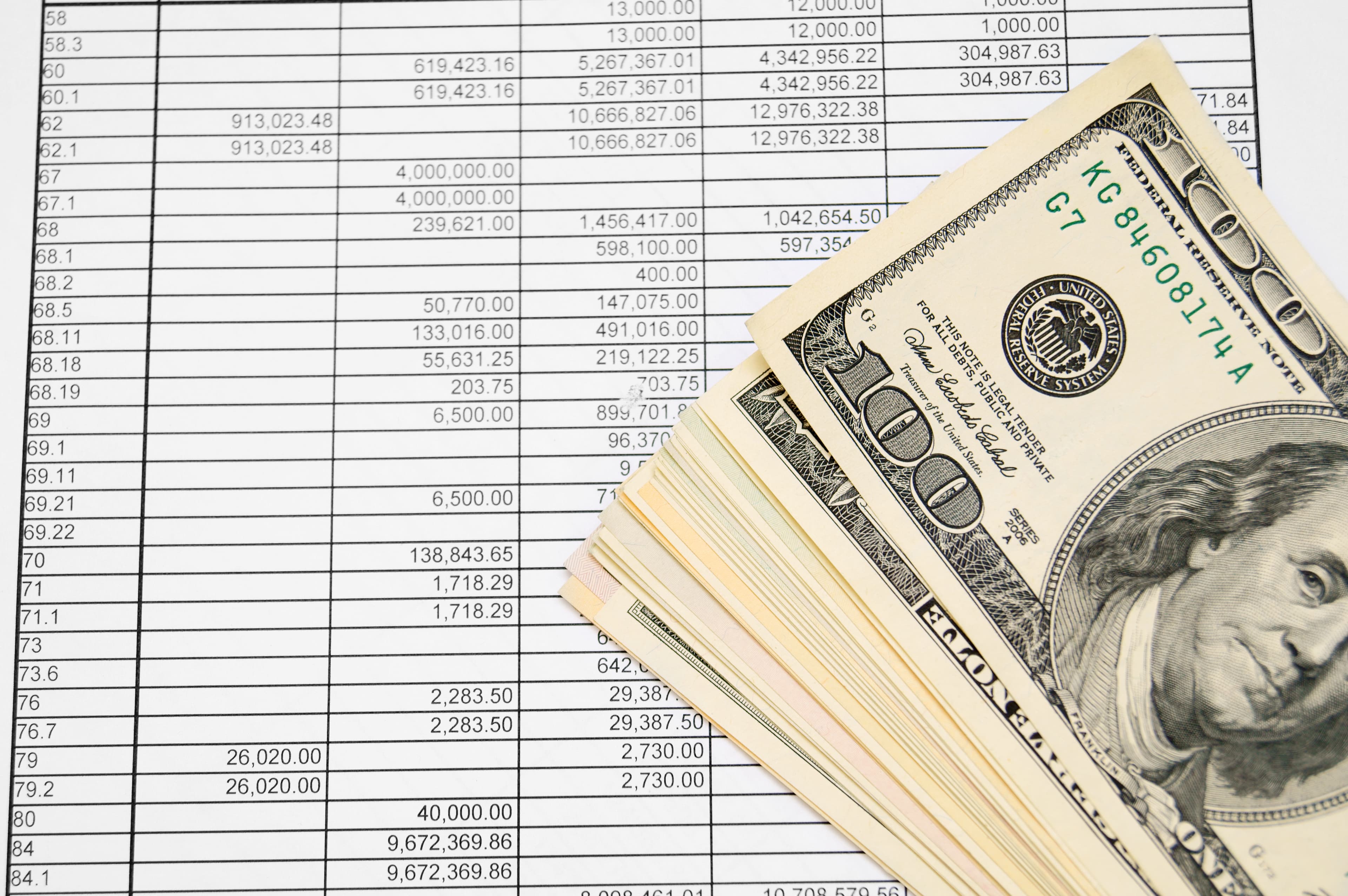 Money and documents on desk