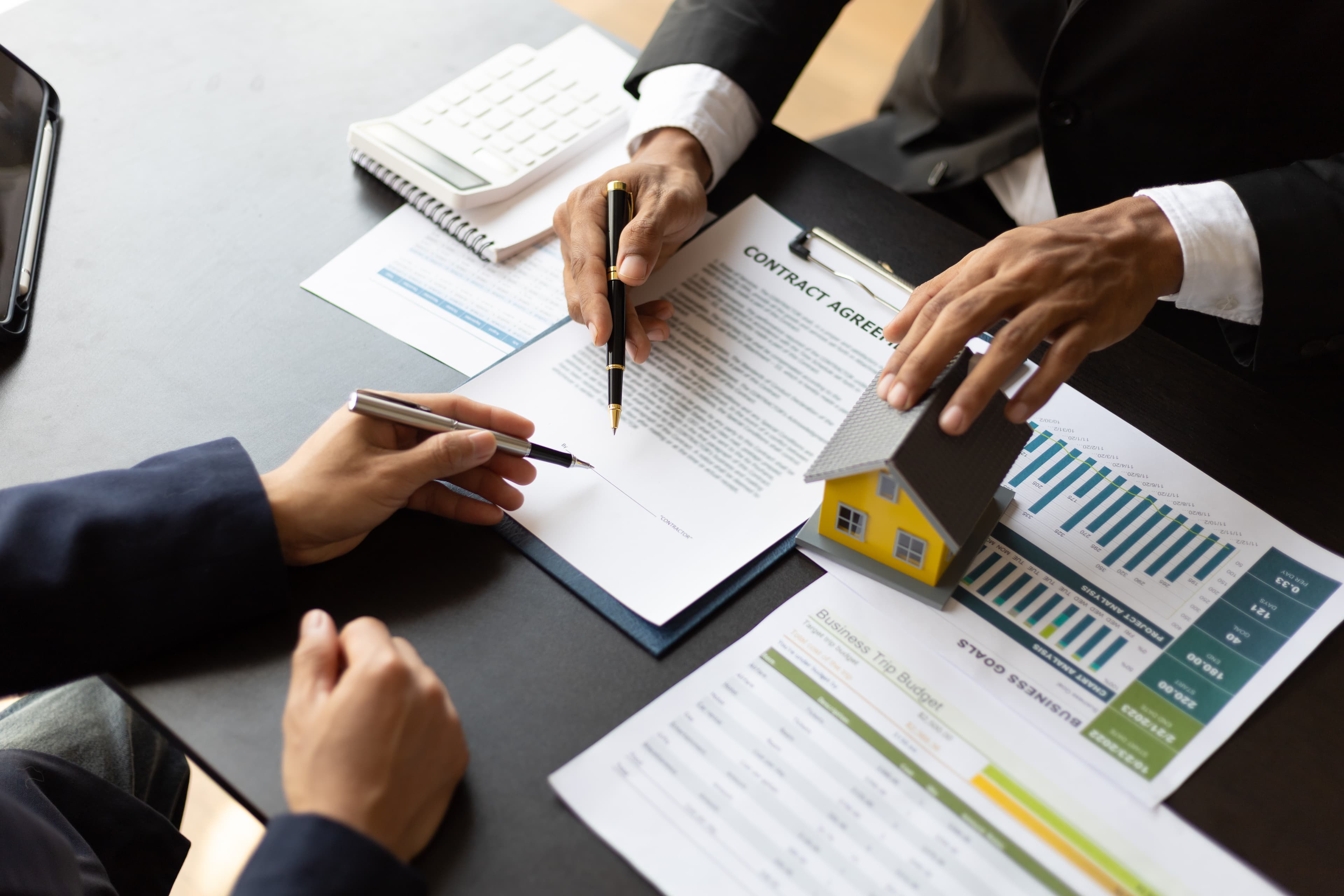 Business people discussing real estate