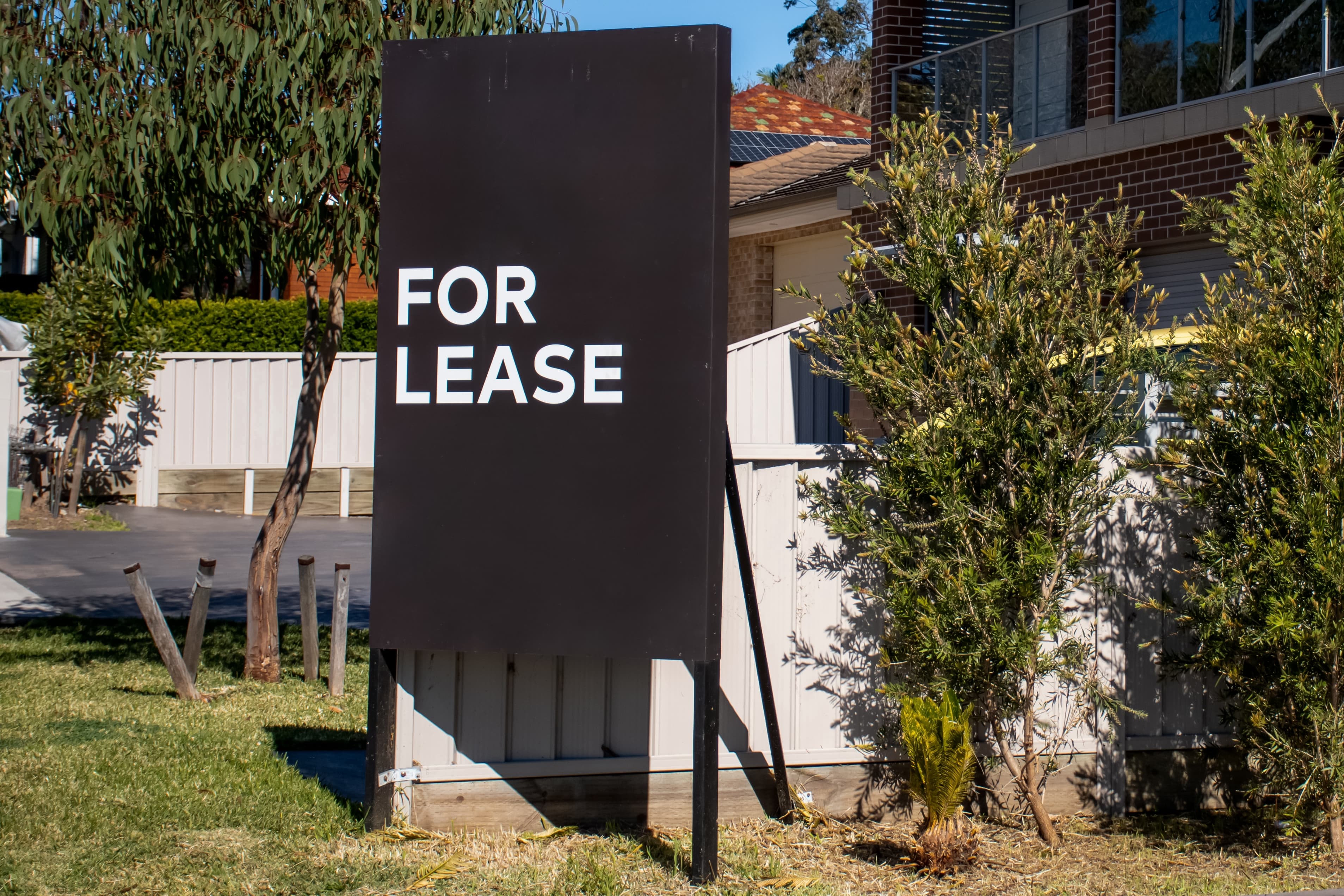 For lease sign in front of a residential house